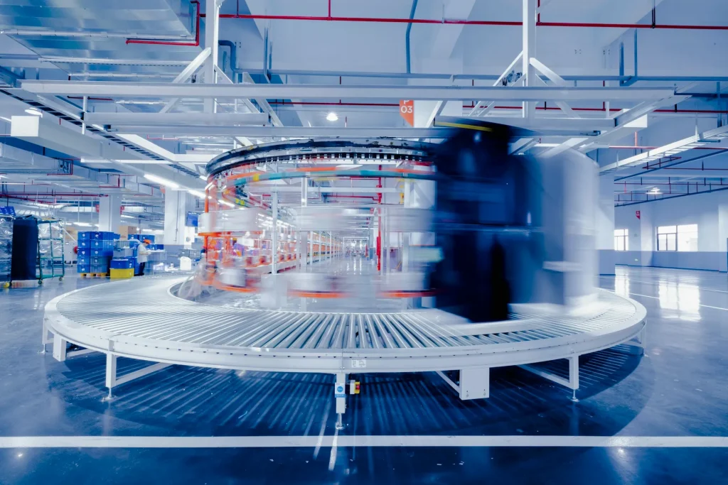 Overhead view of a high-speed bottling and packaging line